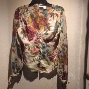 Pretty floral Spring blouse with bow tied sleeve.